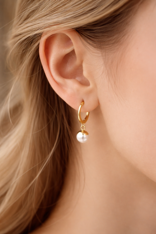 Close-up of pearl drop hoop earrings in stainless steel by A Gift NZ

